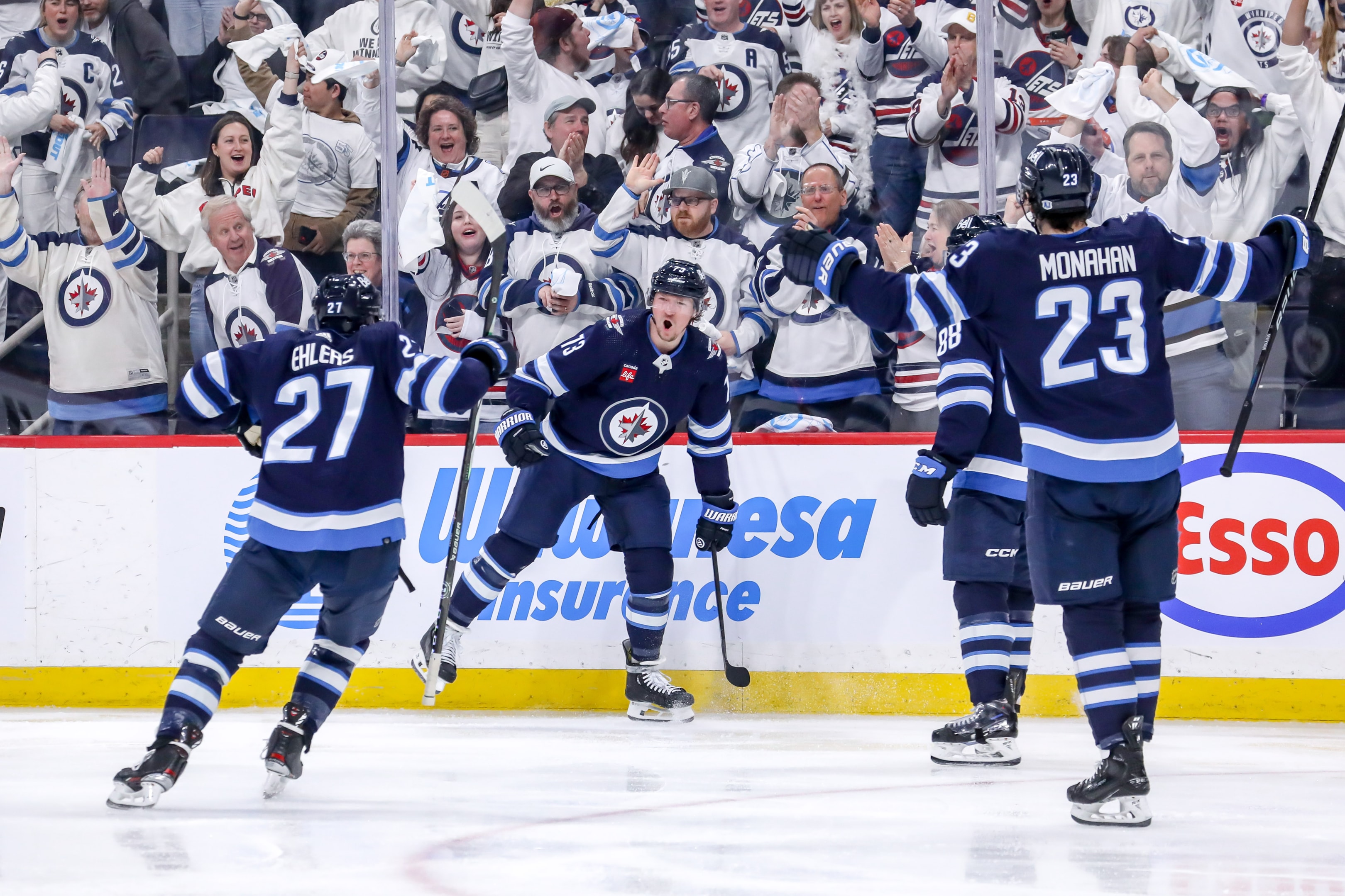  Nikolaj Ehlers, Tyler Toffoli, Nate Schmidt and Sean Monahan of the Winnipeg Jets celebrate a third period goal against the Colorado Avalanche in Game Five of the First Round of the 2024 Stanley Cup Playoffs at the Canada Life Centre on April 30, 2024 in Winnipeg, Manitoba, Canada.