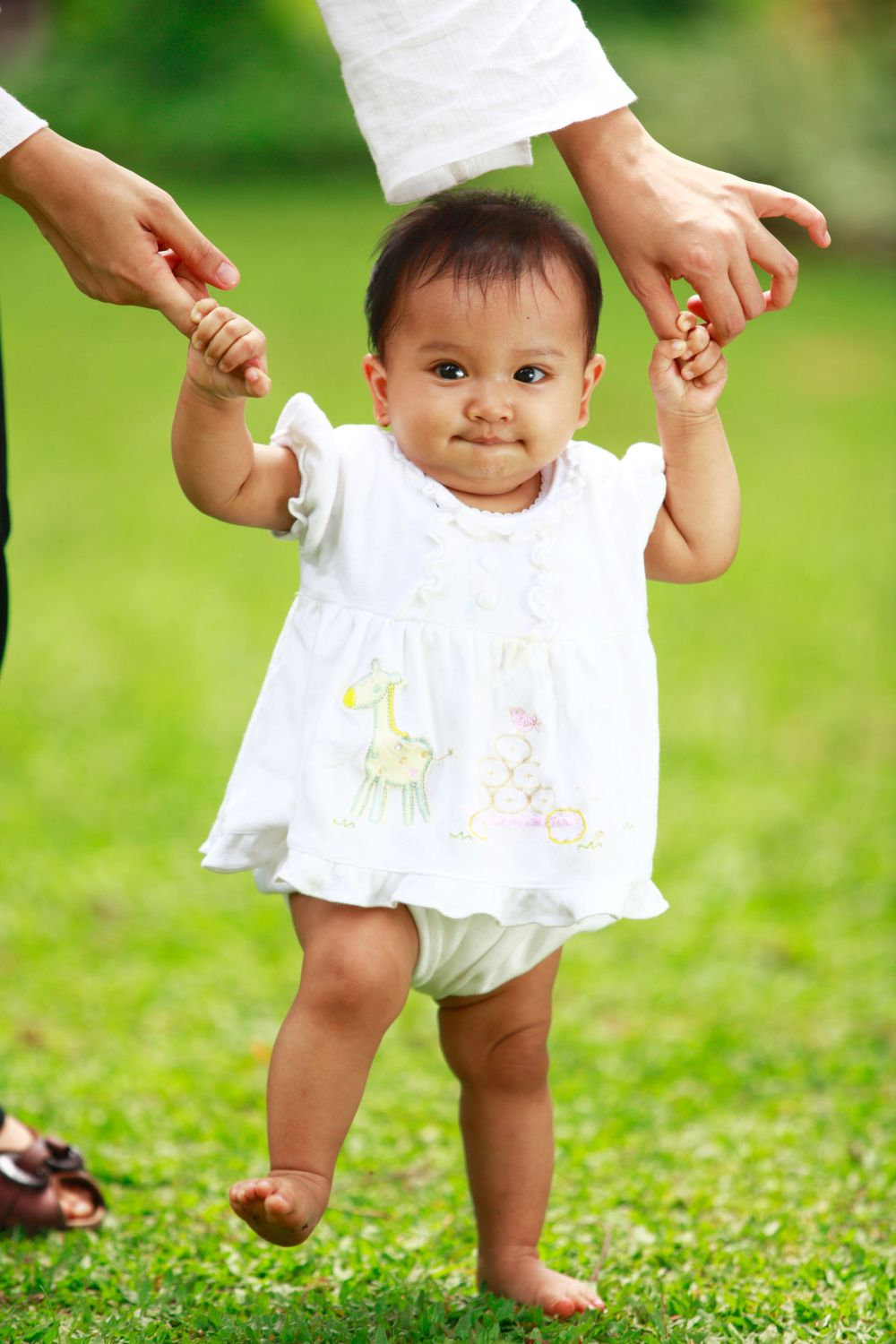 Baby learning to walk - Featured in What Are The Reasons For Delayed Walking In Babies