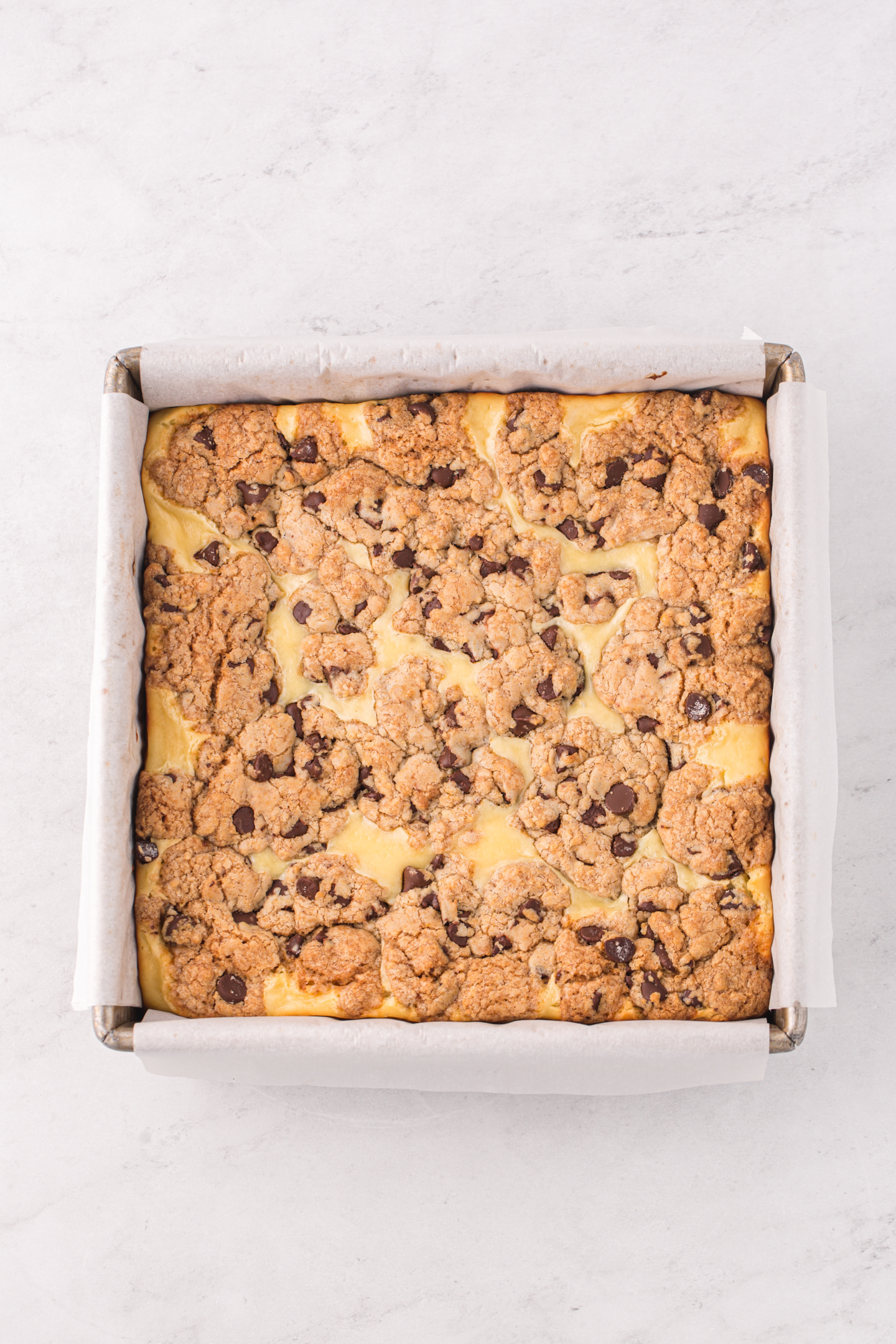 baked chocolate chip cookie cheesecake bars