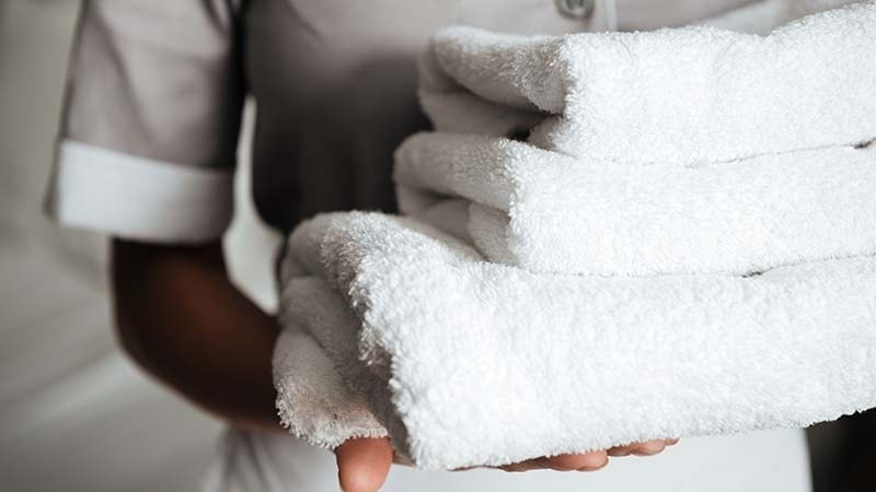 Hotel staff with fresh towels