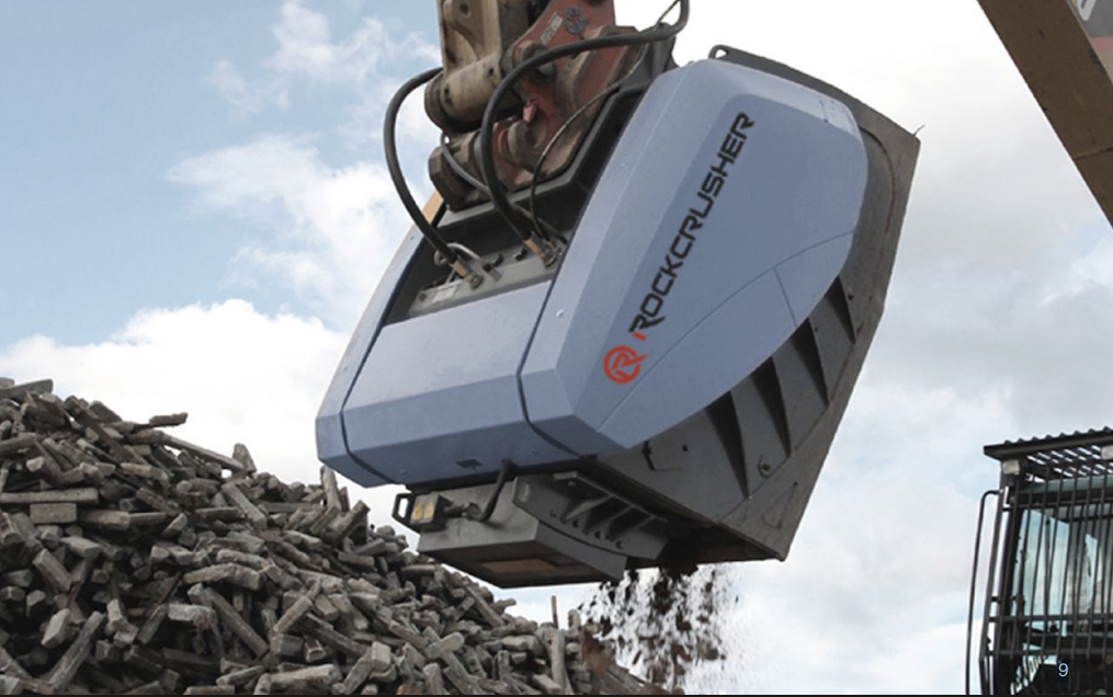 Excavator-mounted Rockcrusher crushing concrete debris on-site Excavator-mounted Rockcrusher crushing concrete debris on-site