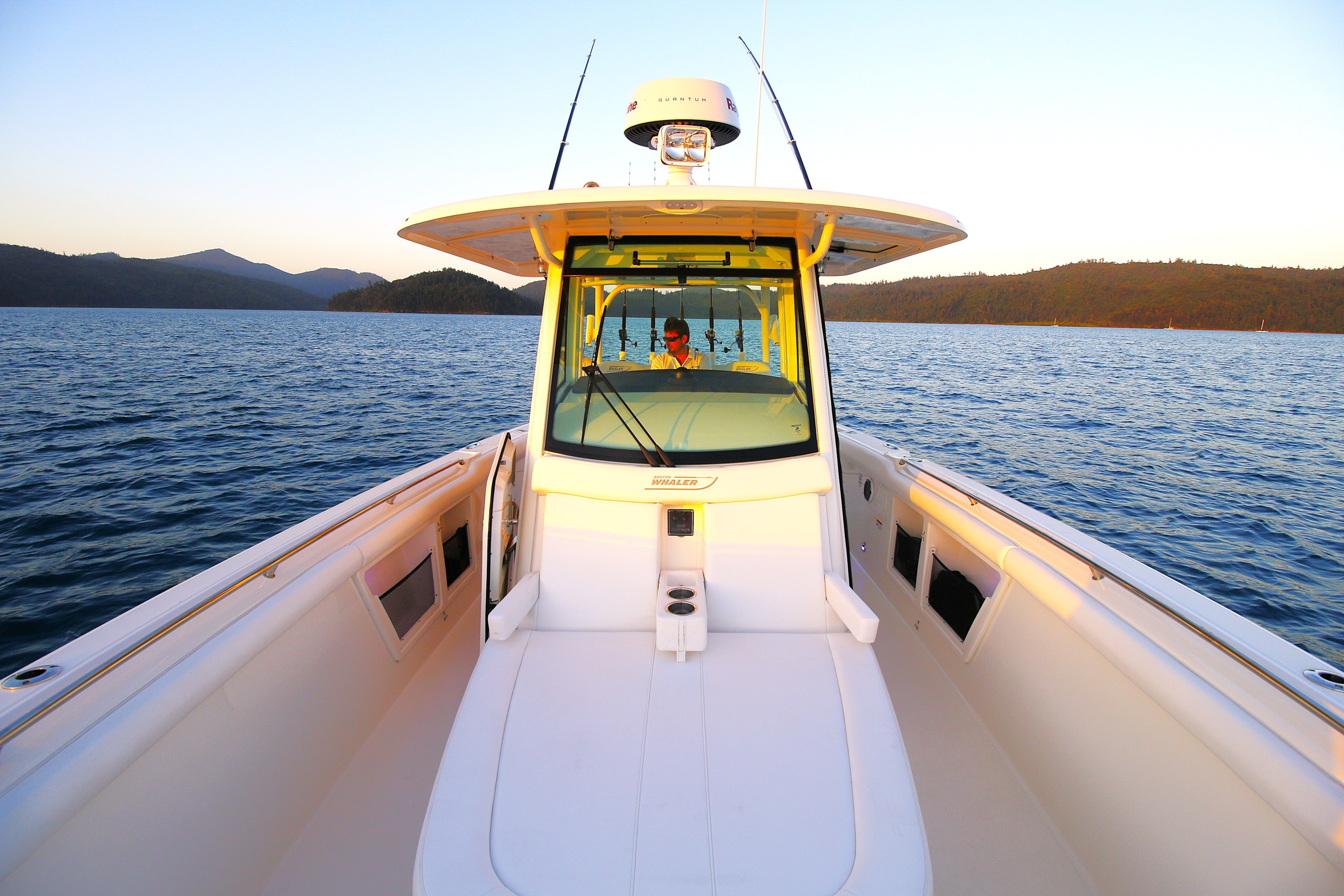 The 350 Outrage premium features include a convenient enclosed head, a watertight mini coffin box, a bow hatch