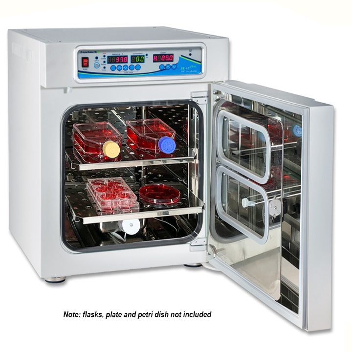 A laboratory incubator with shelves and temperature control system