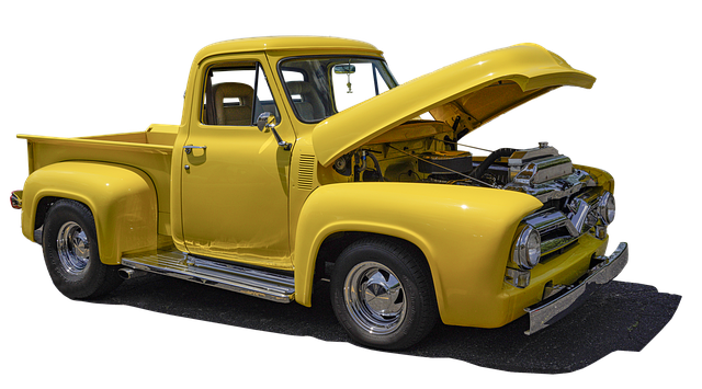 yellow truck with open hood