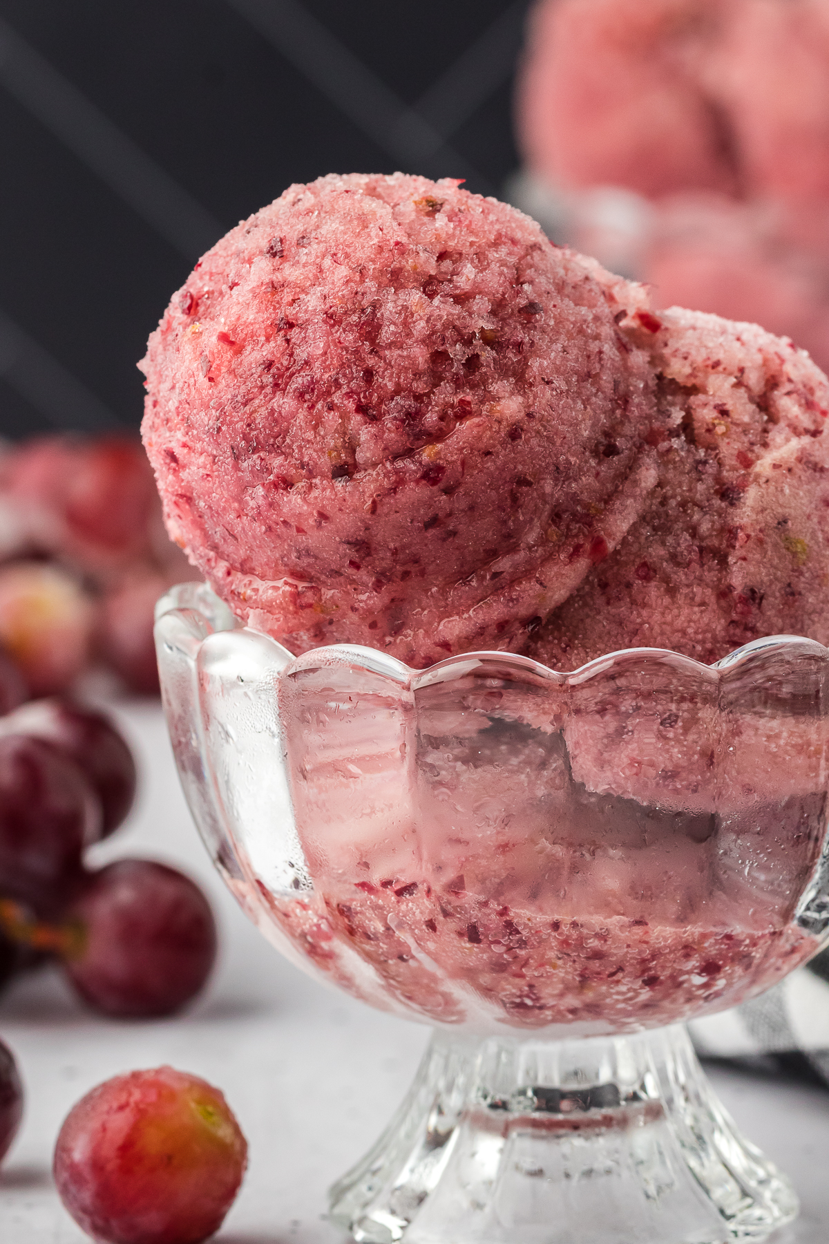 glass dish of red grape sorbet