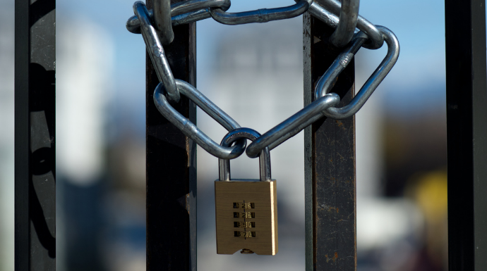 Image is a padlock. Visual illustration of how a vendor lock-in can restrict you.