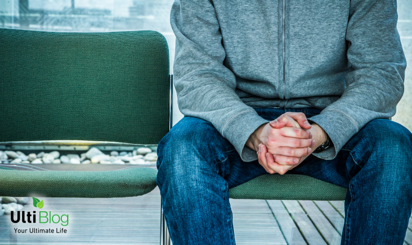 Image of a man with clasped hands, under What Happens If Separation Anxiety Is Untreated?