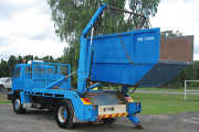Marrell lift skip truck off-loading a large skip bin to get rid of household rubbish
