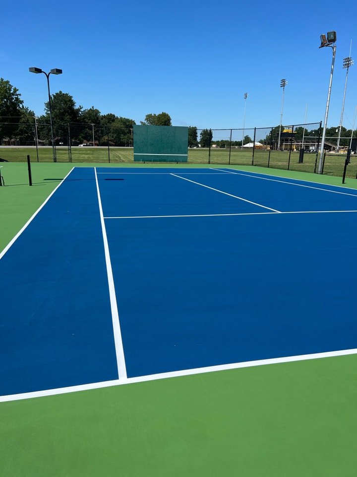 Freshly resurfaced court showing bright colors and smooth surface