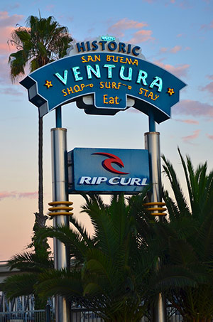Another view of the Ventura pylon sign showcases the city of Ventura and Rip Curl, a local surf shop.