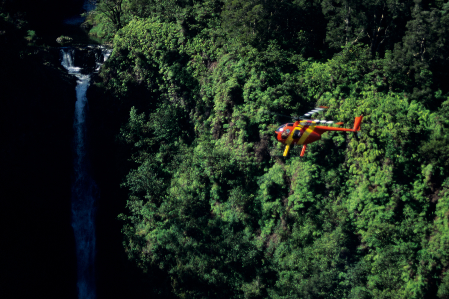 a helicopter tour over pu uka oku falls 