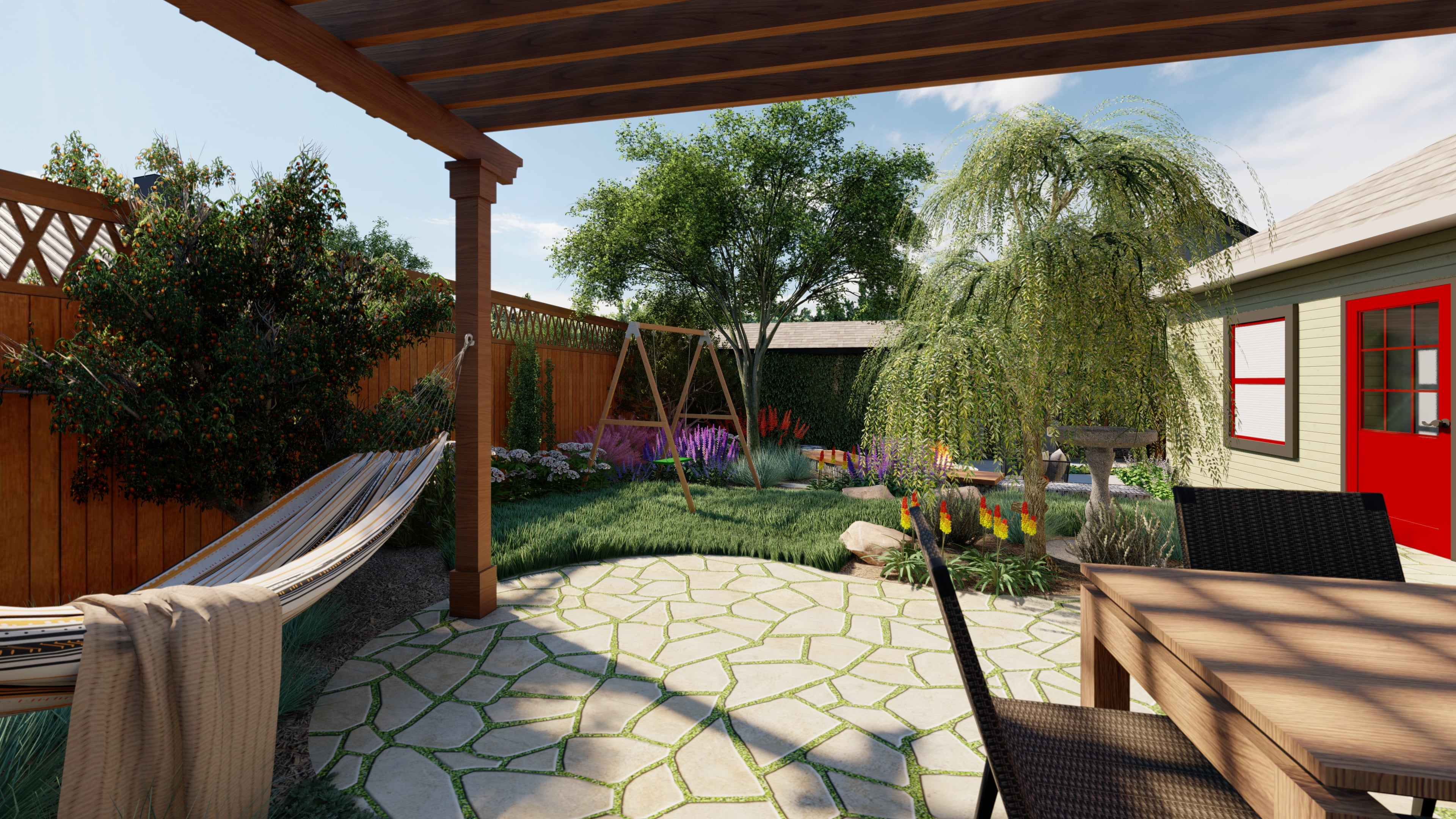 A hammock next to a seating area in a small backyard