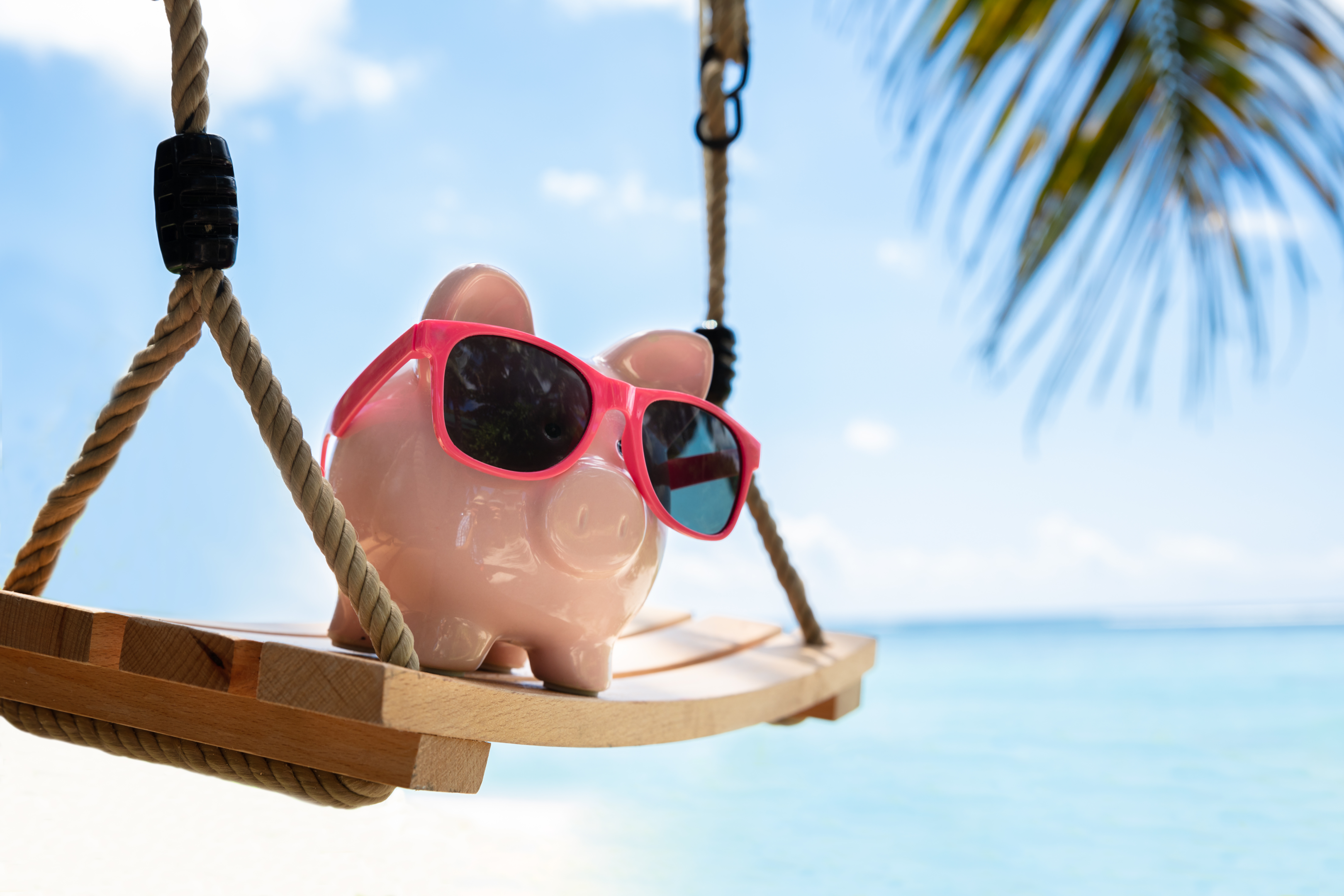 piggy bank on the beach
