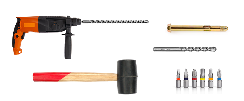 From left to right - a masonry drill, masonry screws, a drill bit, a rubber mallet and some screwdriver heads.