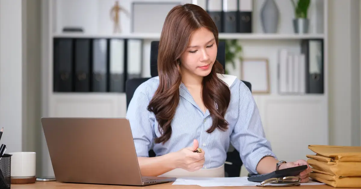 Woman reviewing Form 12153 and IRS collection notice before requesting a Collection Due Process hearing