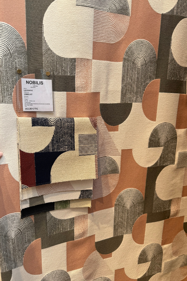 Nobilis wallpaper and fabrics off the roll and prior to installation in a showroom (perfect in bathrooms or dining rooms even with the simple geometry)