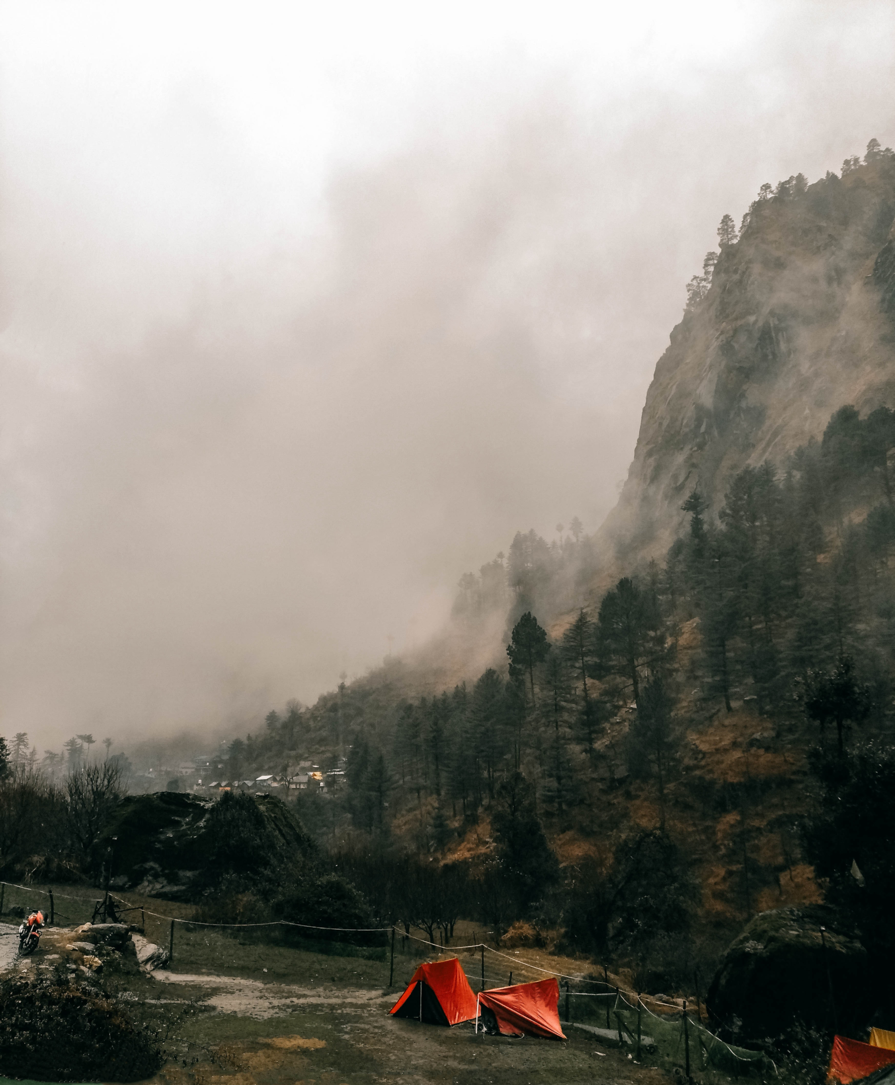 Red tents, fog 