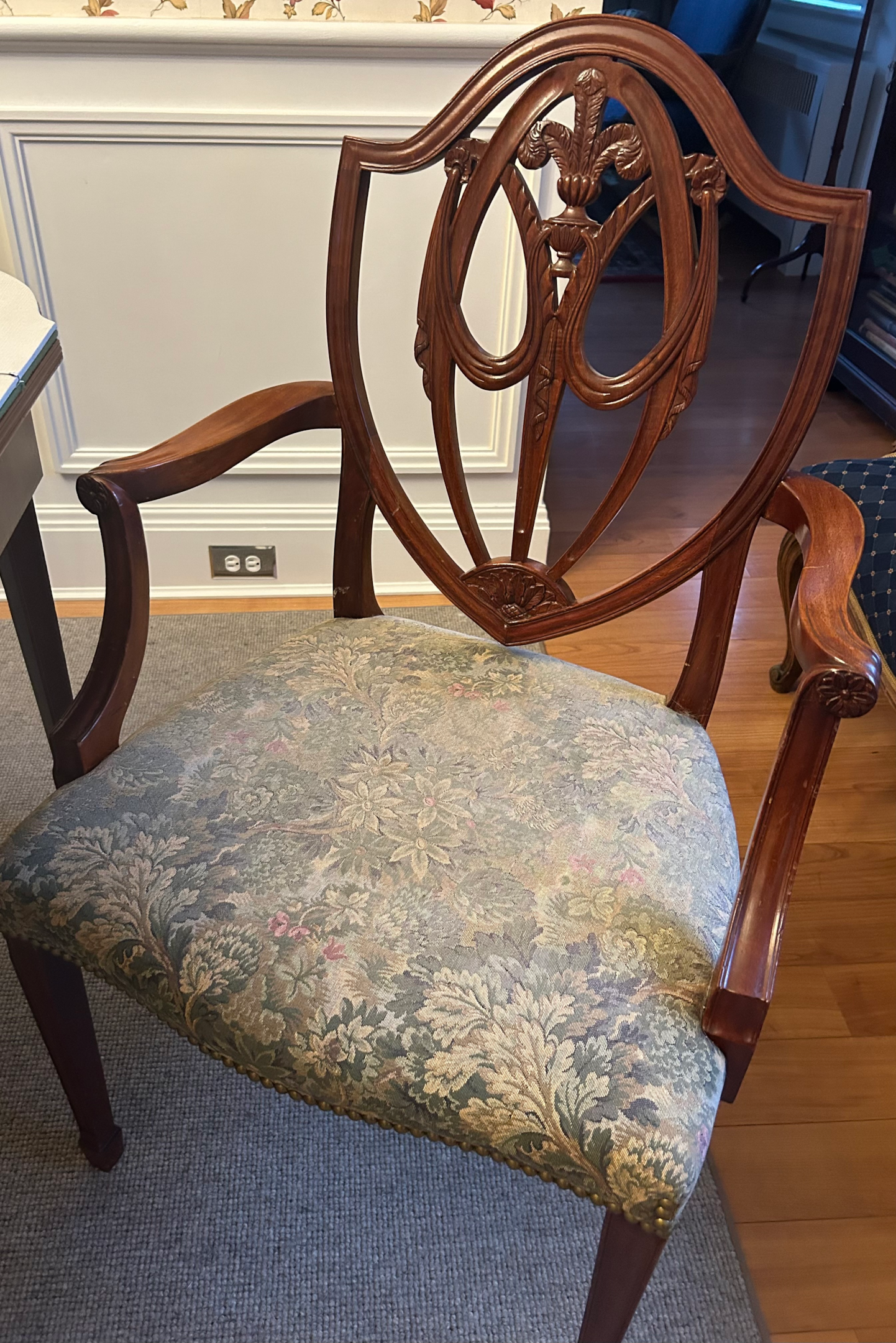 This dining room chair would be a good basic reupholstery project