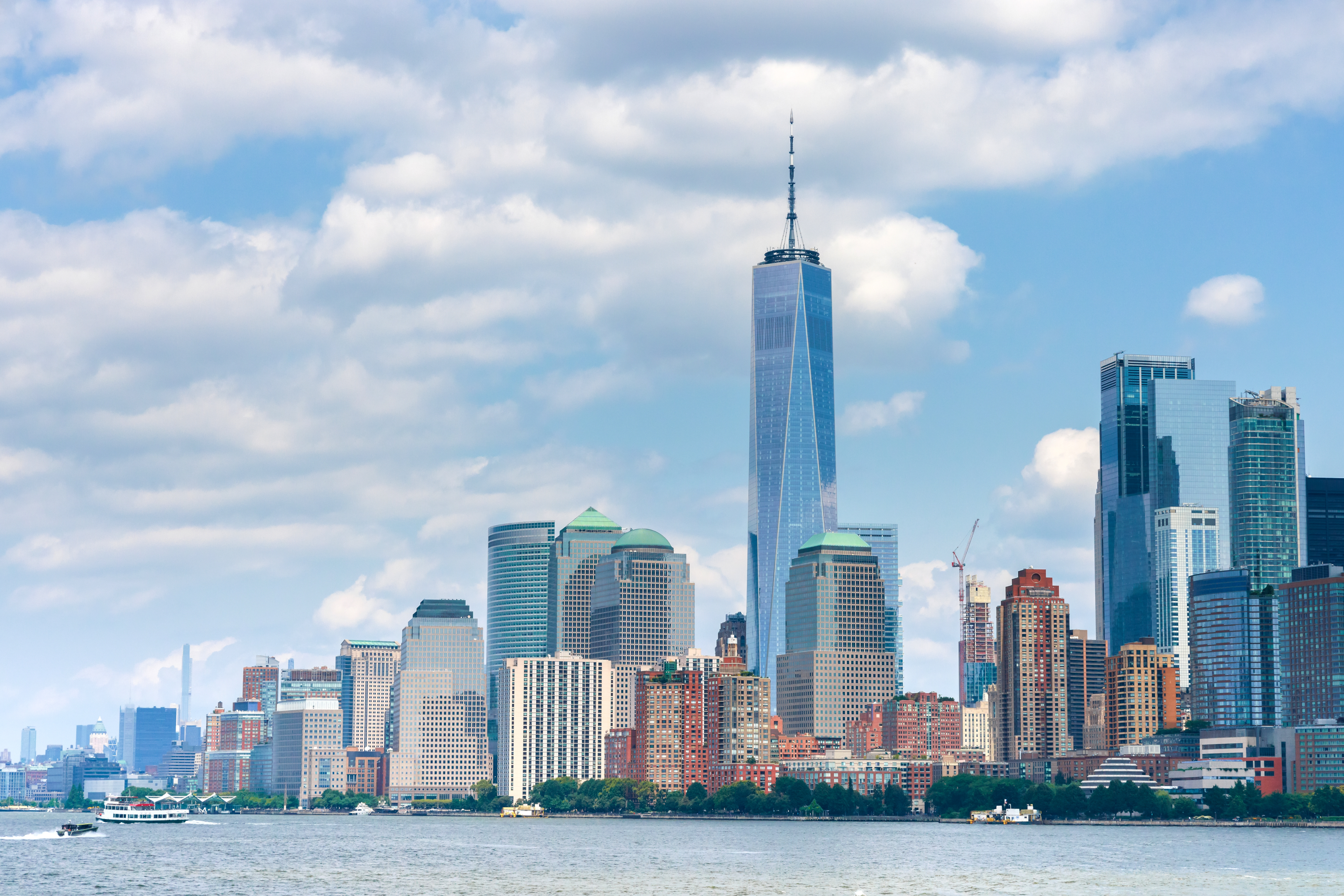 Skyline of NYC with view of one world trade center and empire state building