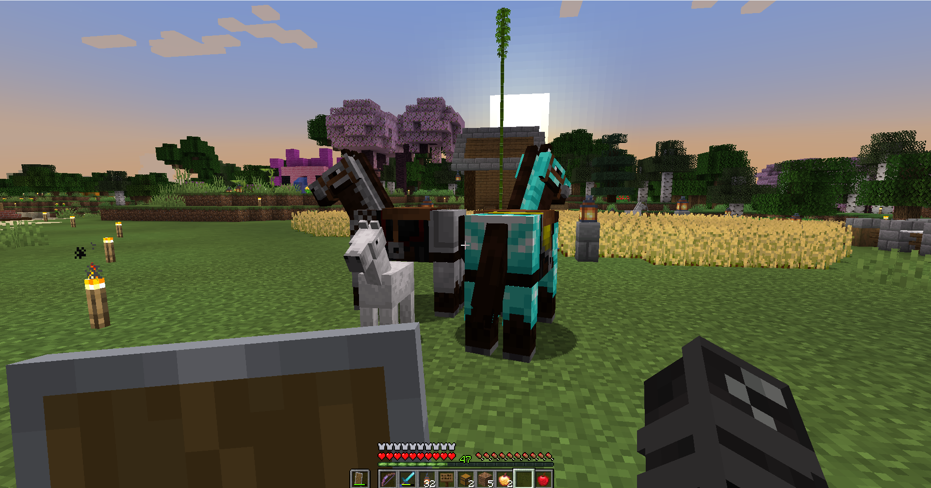 Parent horses with their foal in Minecraft.