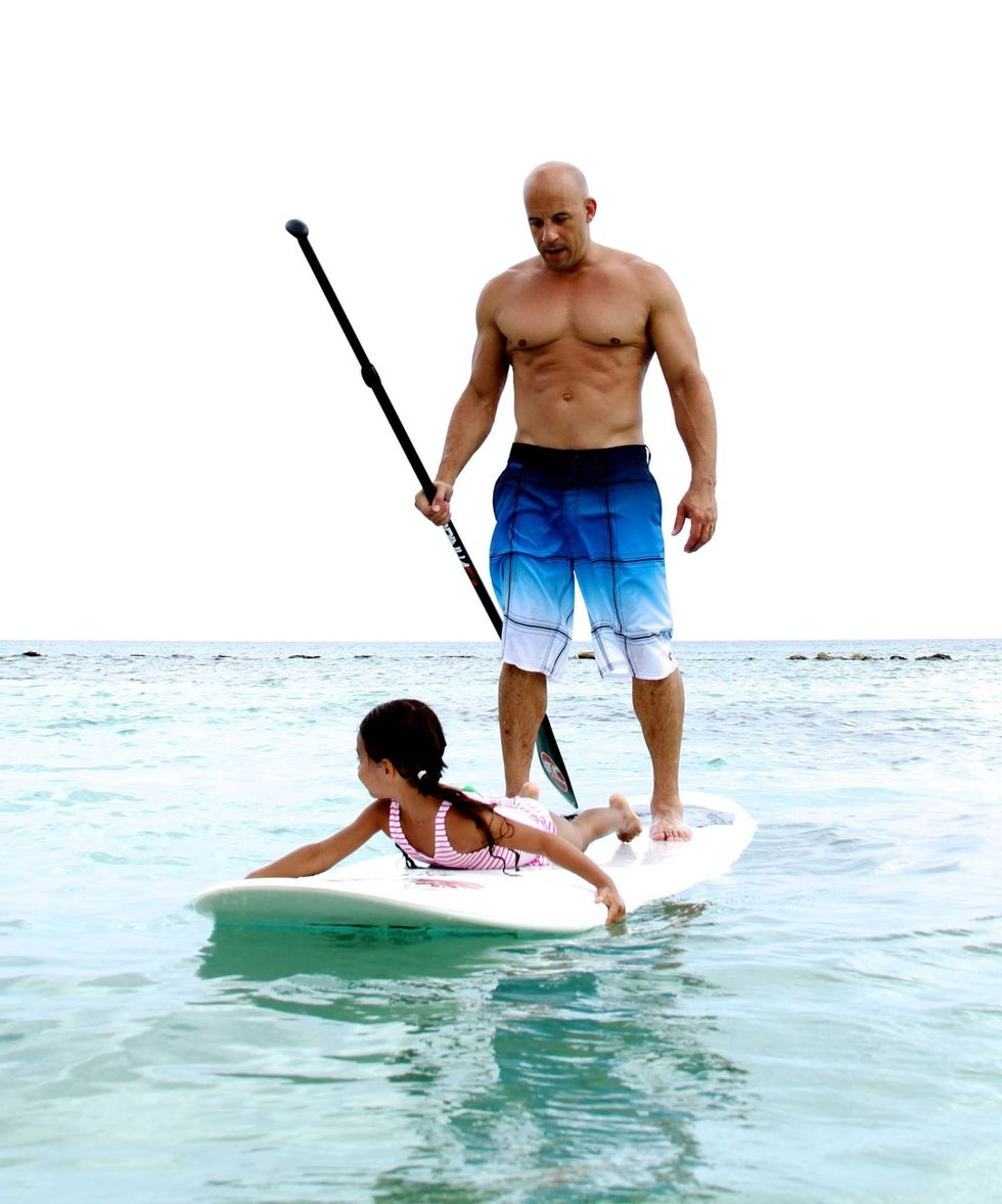 celebrity on a stand up paddle board