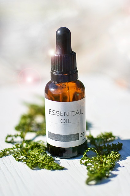 An image of a glass bottle of an essential oil with a label that reads, essential oil.