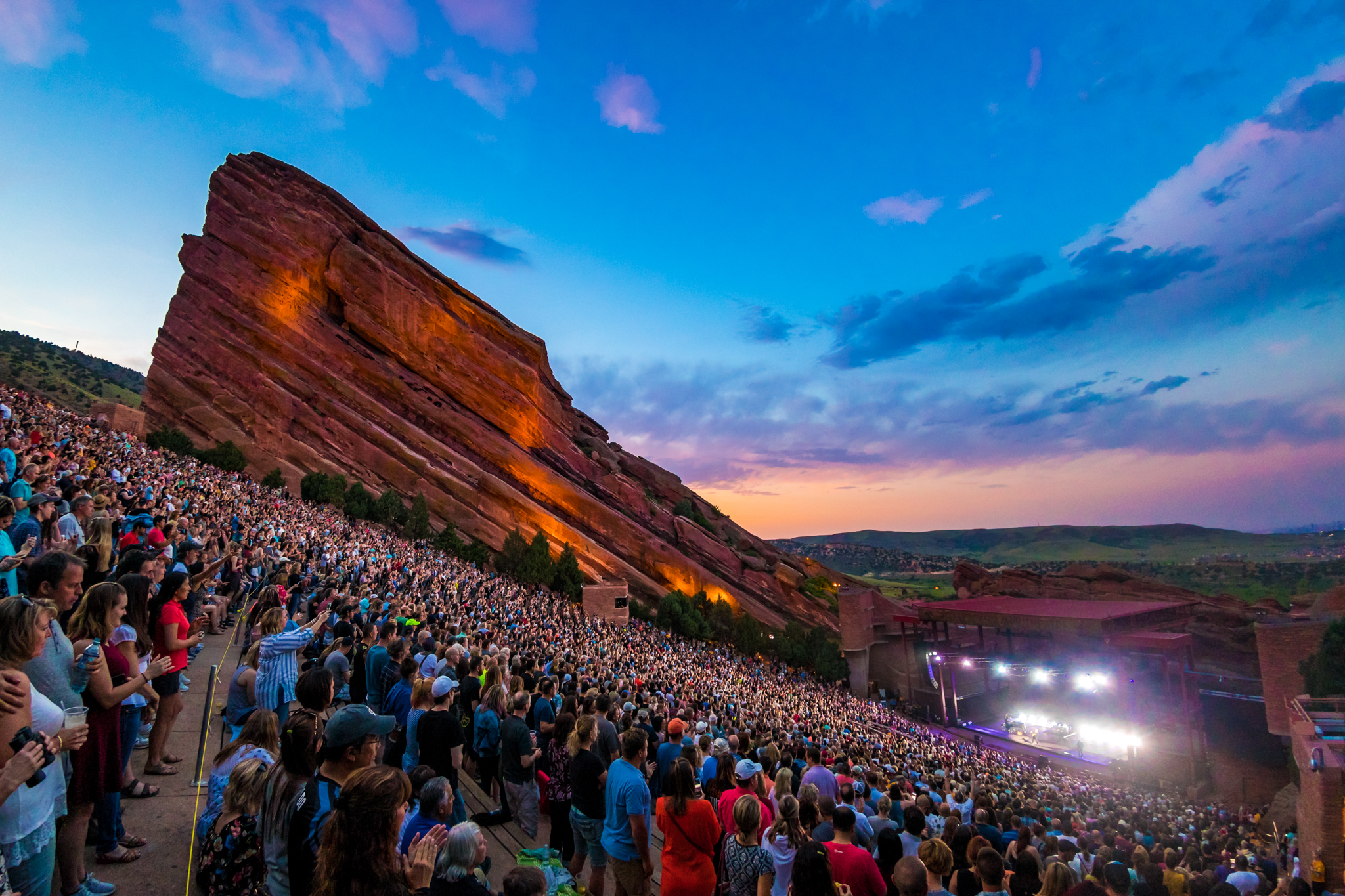 Red Rocks Amphitheatre during a concert at sunset 