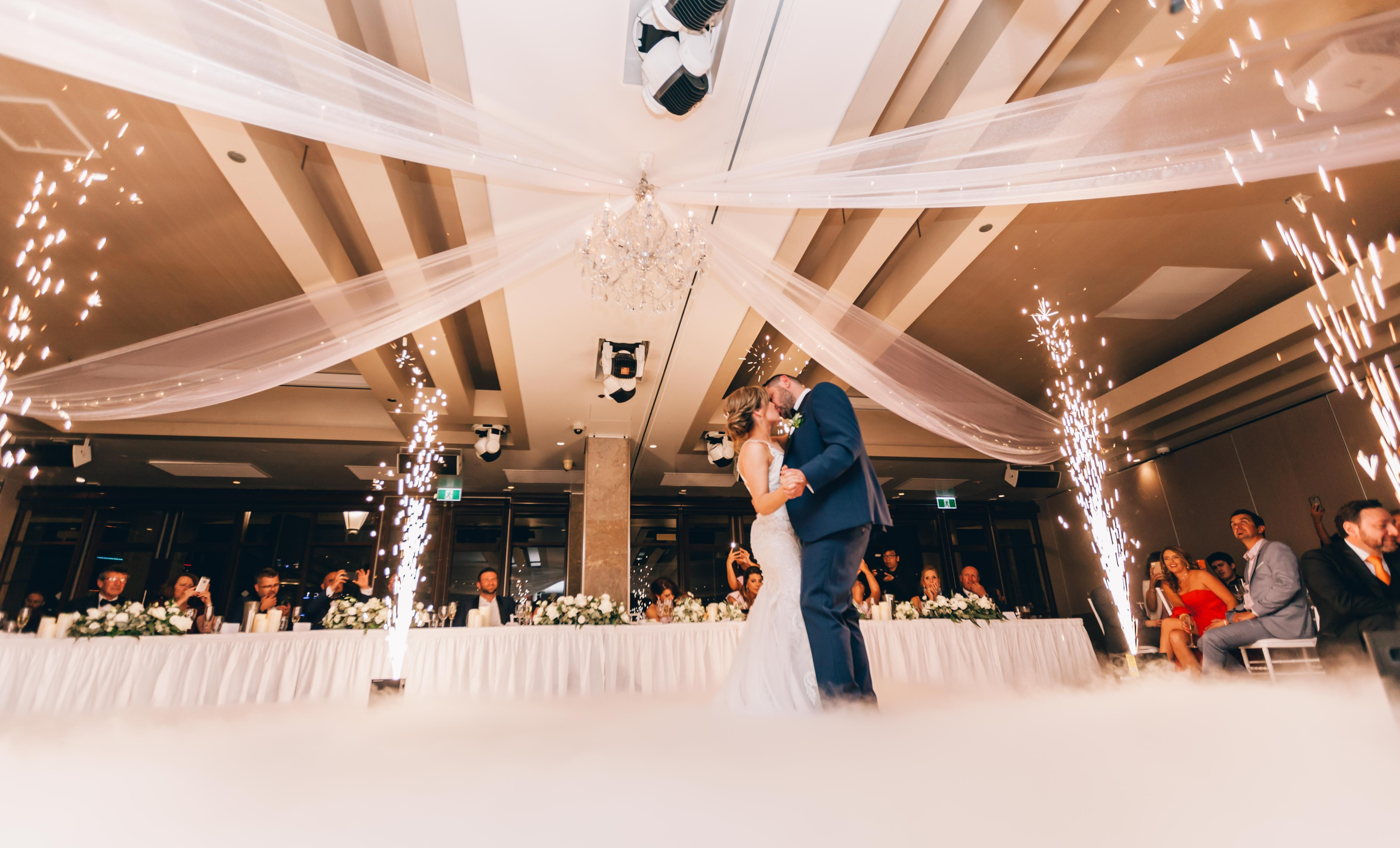 Photo by TranStudios Photography & Video: https://www.pexels.com/photo/low-angle-photography-of-bride-and-groom-dancing-3082764/