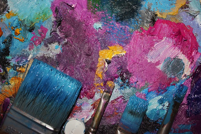 paints, brushes, multicolored art block