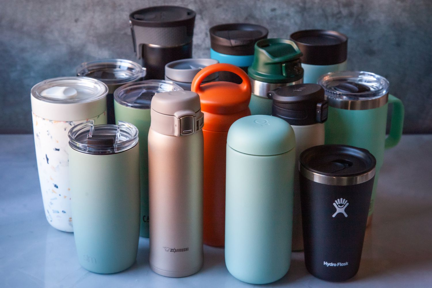 Travel mugs comes in wide range of shapes and sizes including flasks that even match with the same logo.