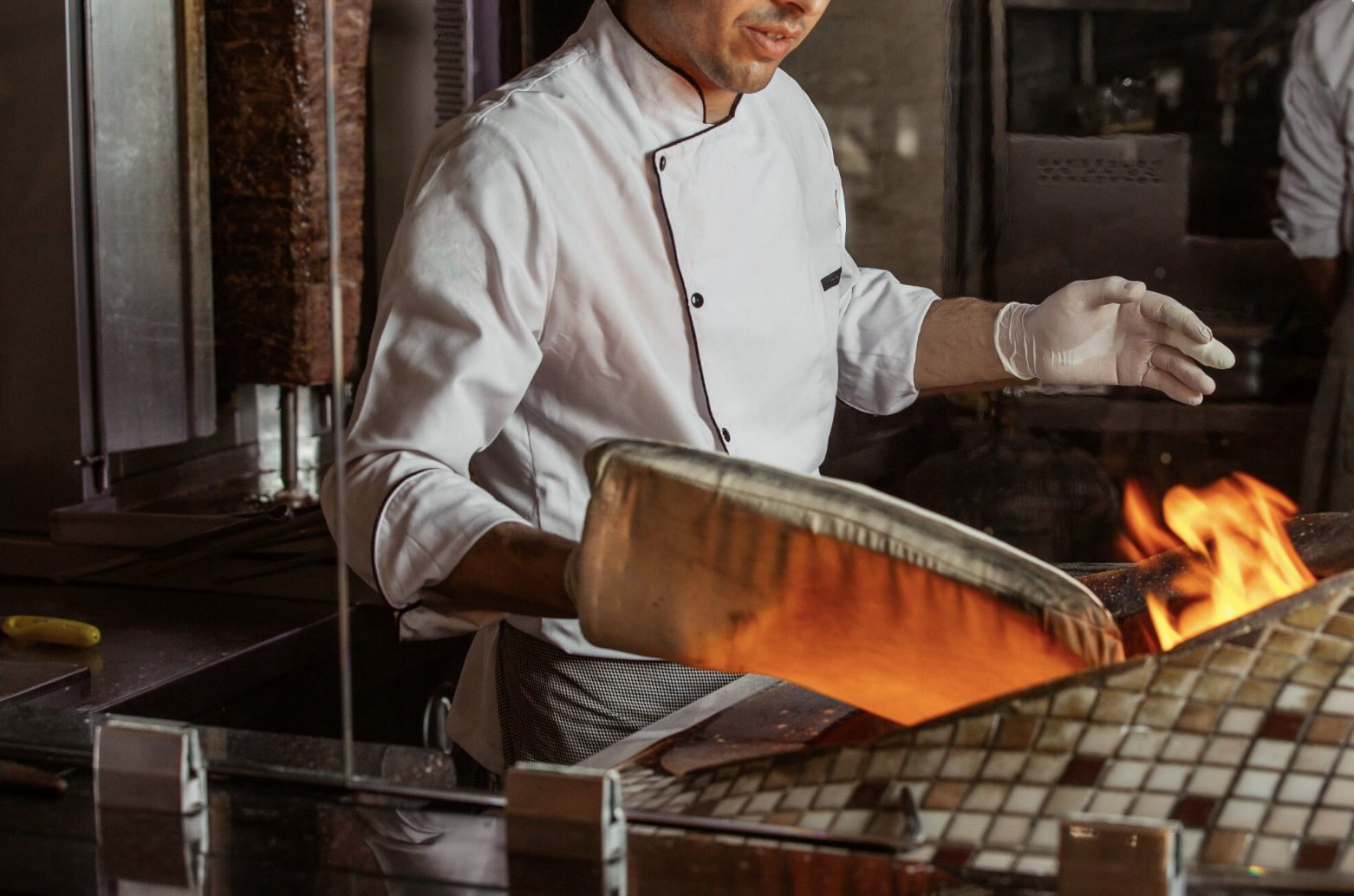 A chef cooking in the kitchen