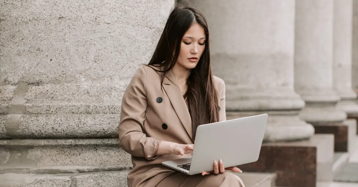 OnlyFans creator tracking taxes and income with payroll software features for her OnlyFans business.