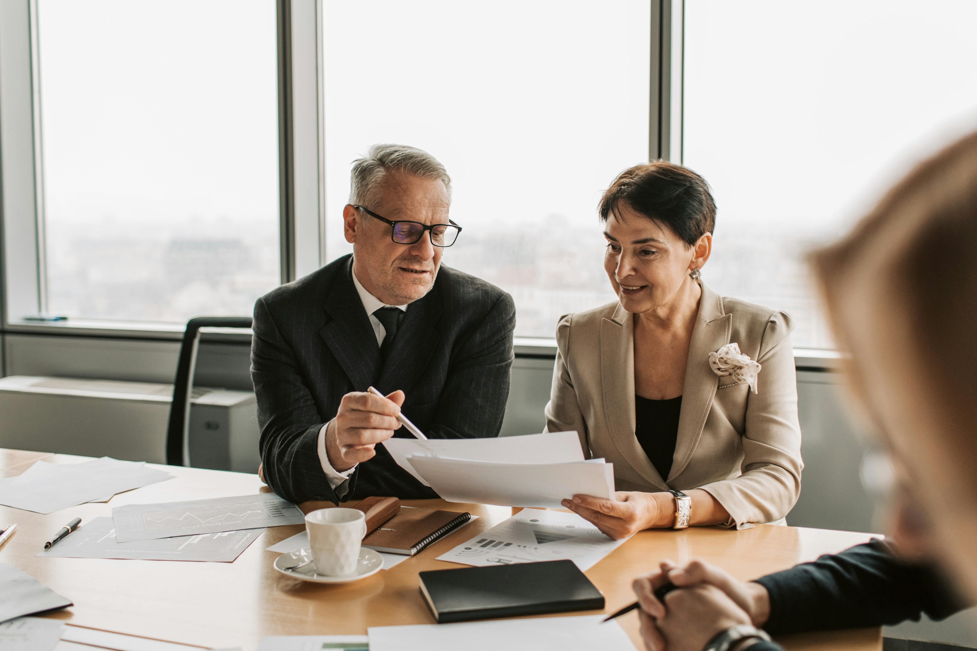 Real estate investment team reviews cold calling data in order to adjust strategy.