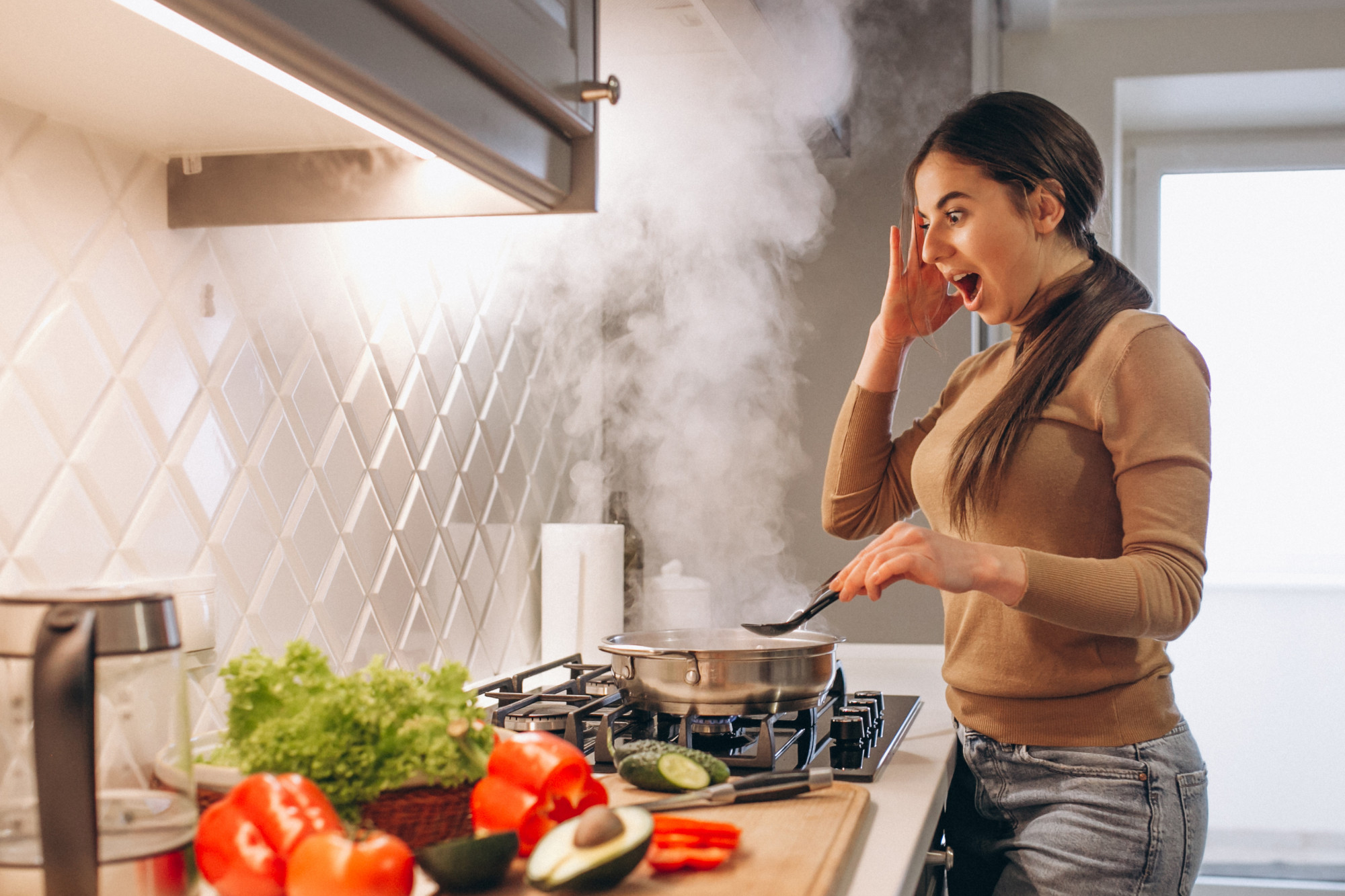 A shocked woman in the kitchen