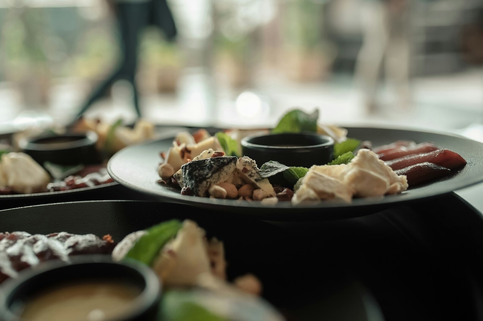 A dining table filled with an assortment of dishes, representing the culinary offerings of Singapore restaurants.