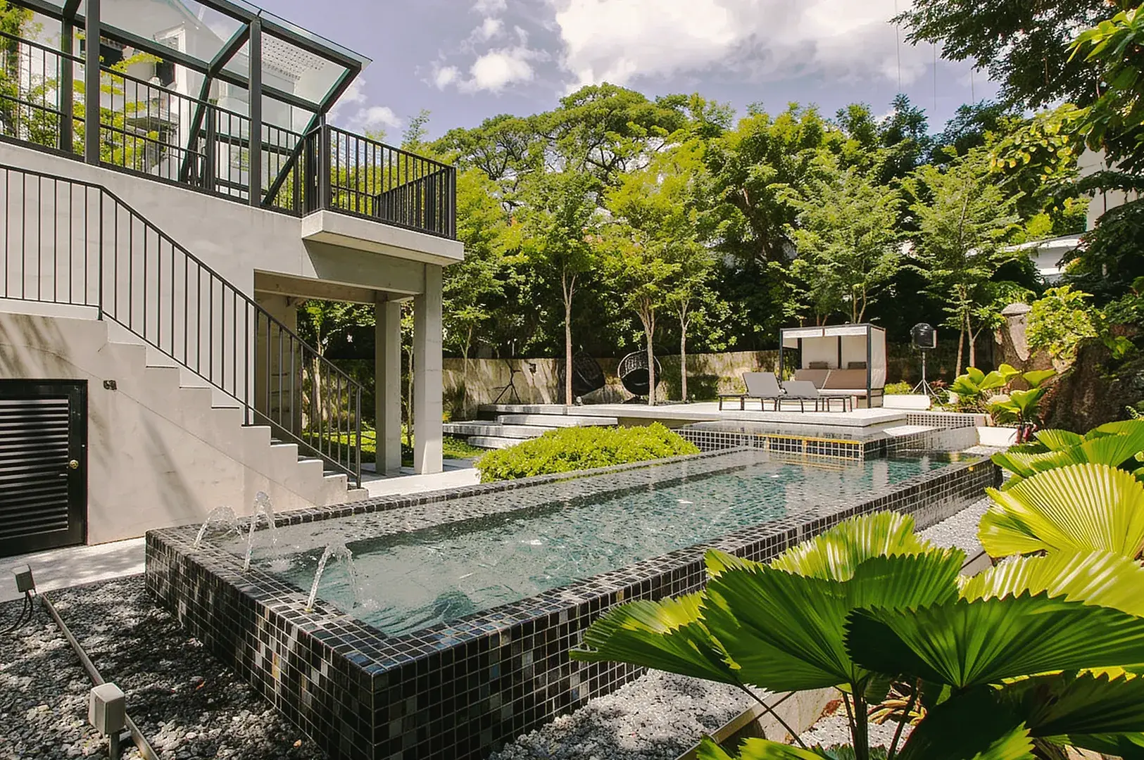 Contemporary Singapore villa with outdoor pool, landscaped garden, and minimalist architecture.