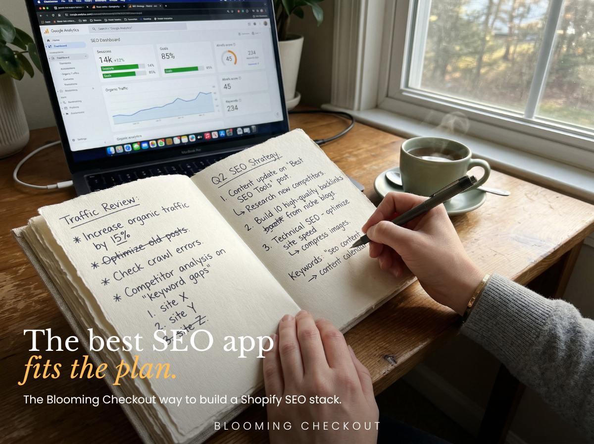 Handwritten Q2 SEO strategy notebook beside a laptop showing a Google Analytics organic traffic dashboard, planning the best SEO app for Shopify stack.