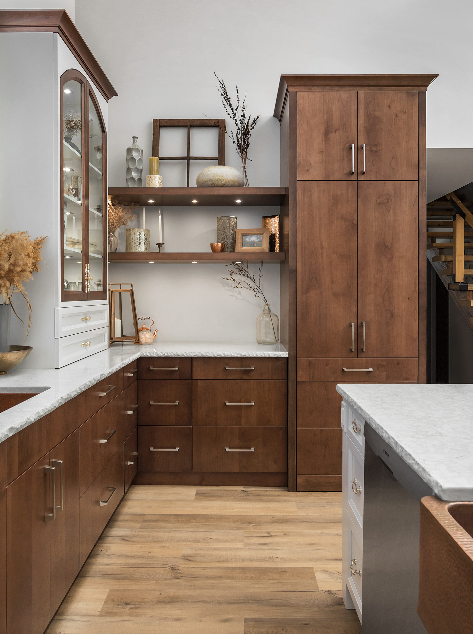 brown kitchen cabinets with floating shelves