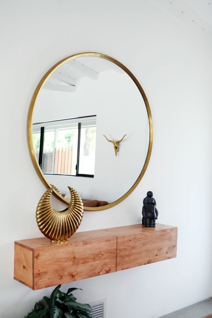 Large round mirror with golden frame