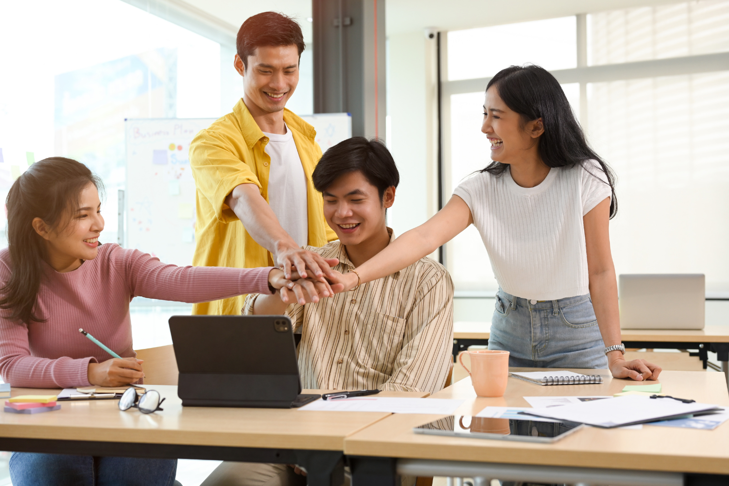 employees practicing group collaboration.
