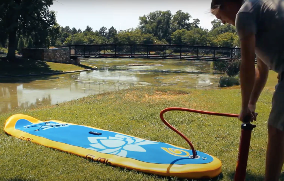 pump hose connected to the inflatable sup board