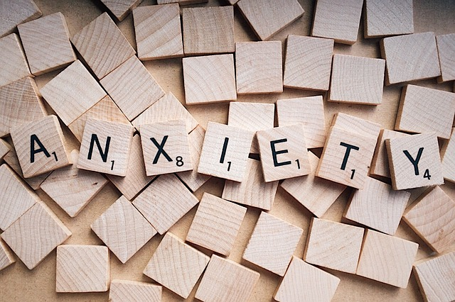 An image of a stack of scrabble blocks spelling out the word 