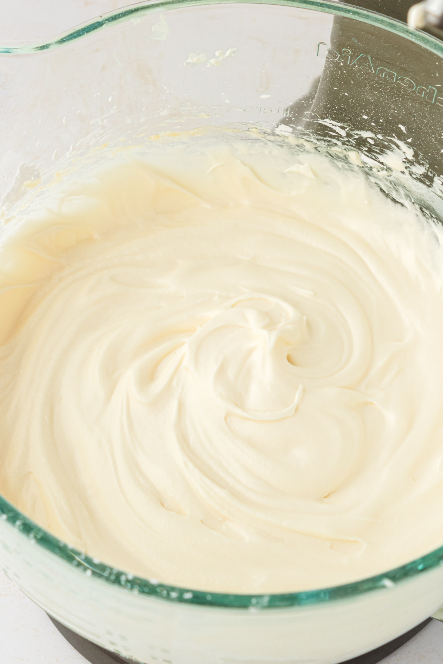cream cheese frosting in a large bowl