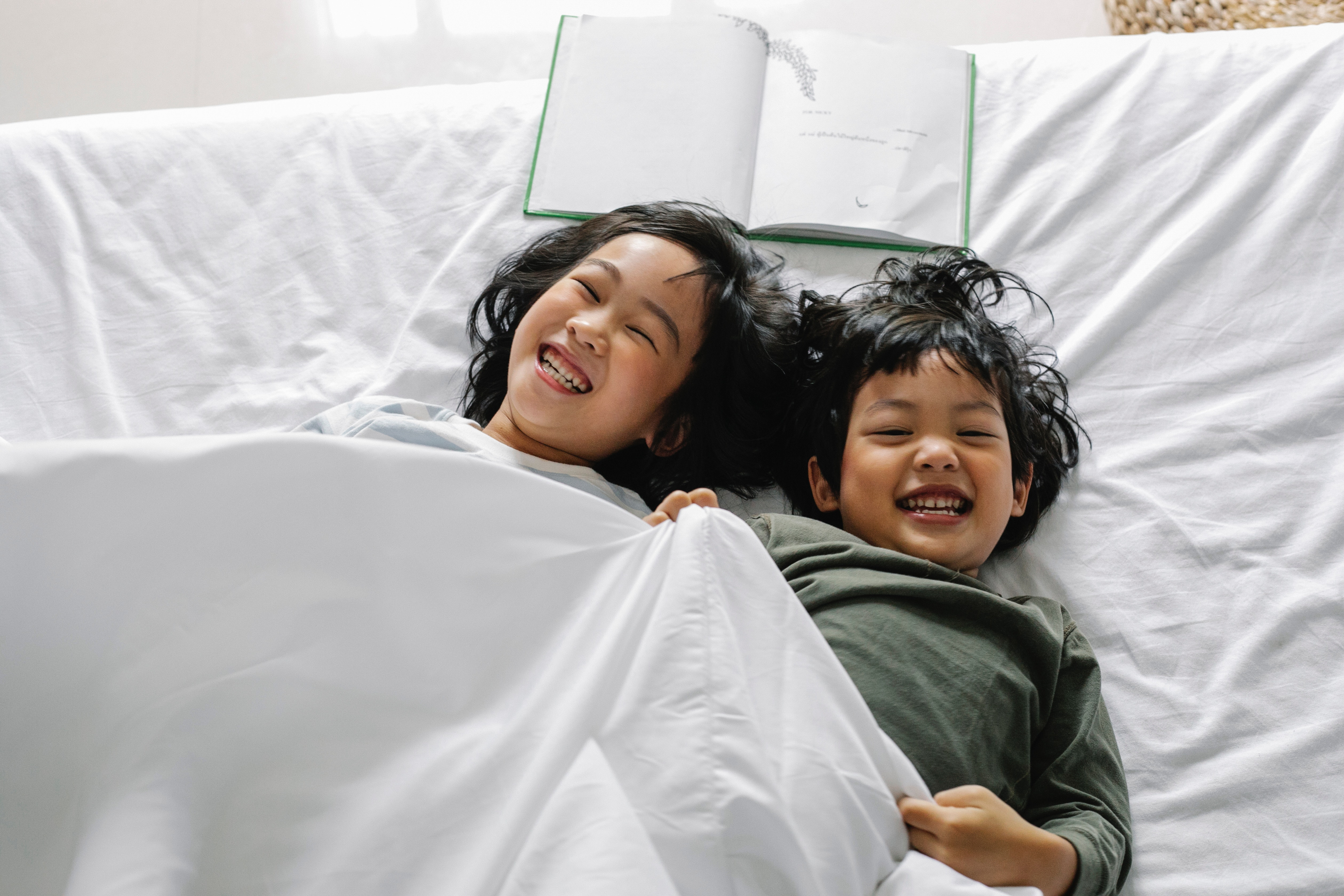 Children at Home | Photo by Alex Green from Pexels | https://www.pexels.com/photo/happy-ethnic-kids-having-fun-in-bed-5692254/