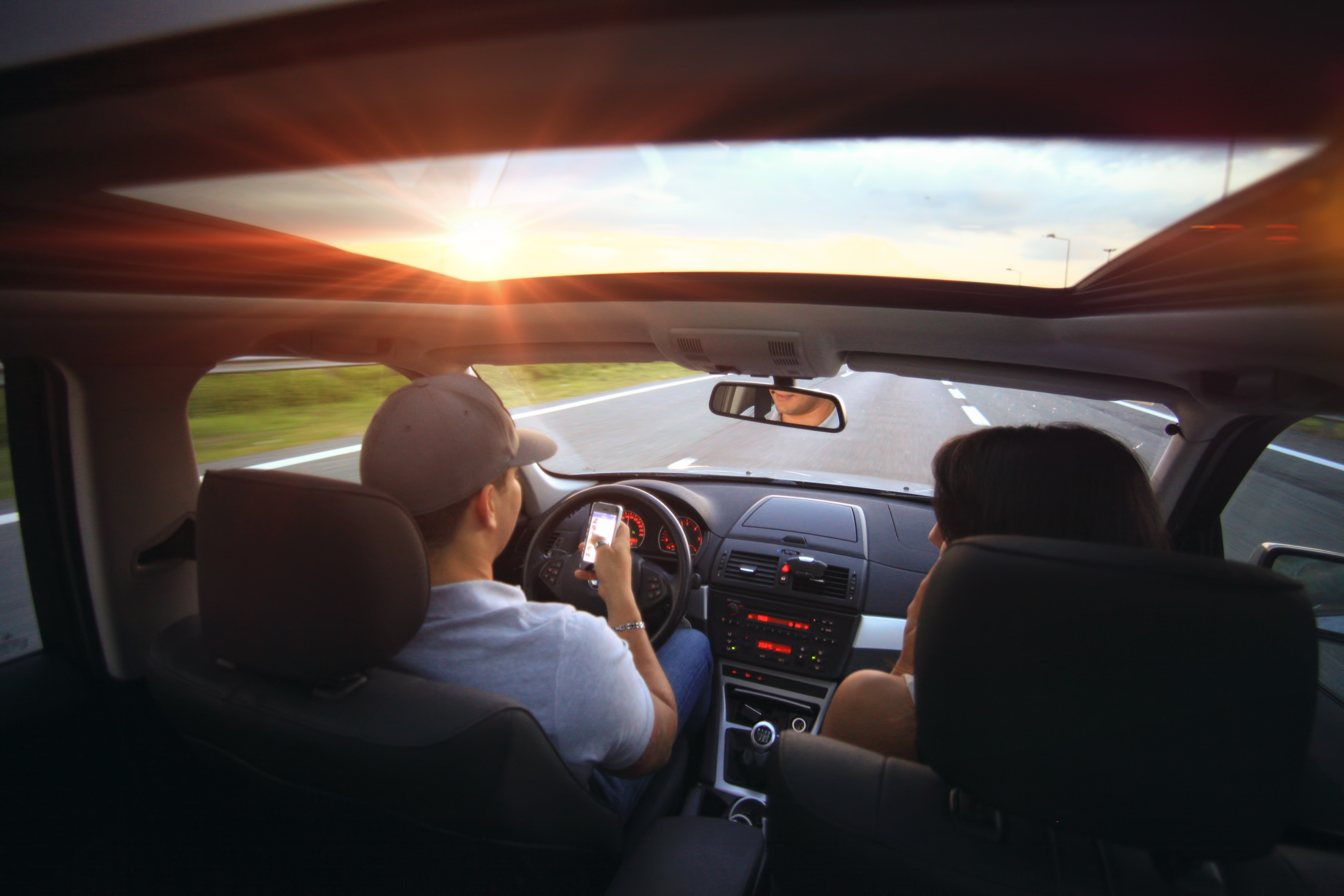 Couple inside a rental car