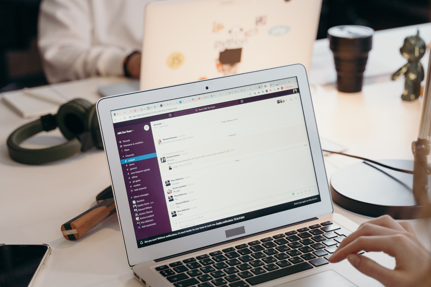 Slack showed on laptop screen.