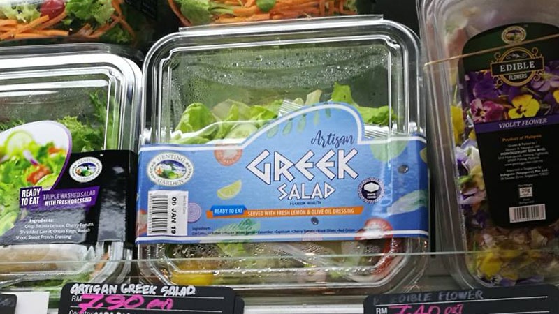 flexible sleeve on salad container