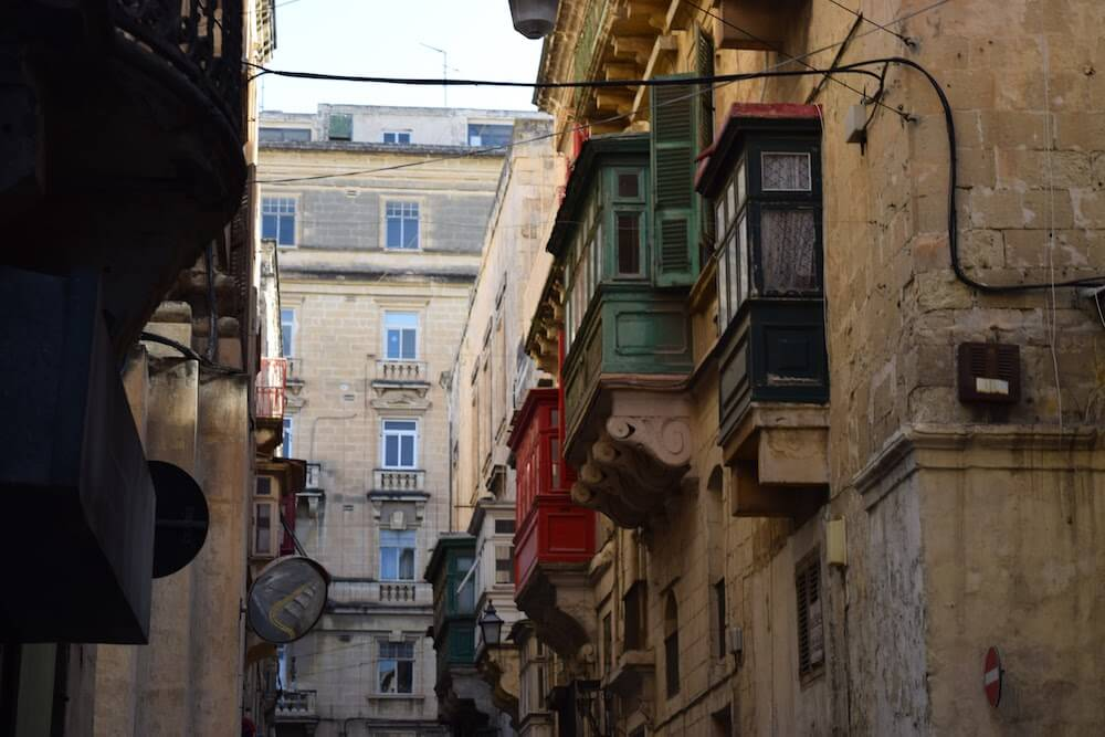 In Malta you can see decorative supports jutting out of almost every building