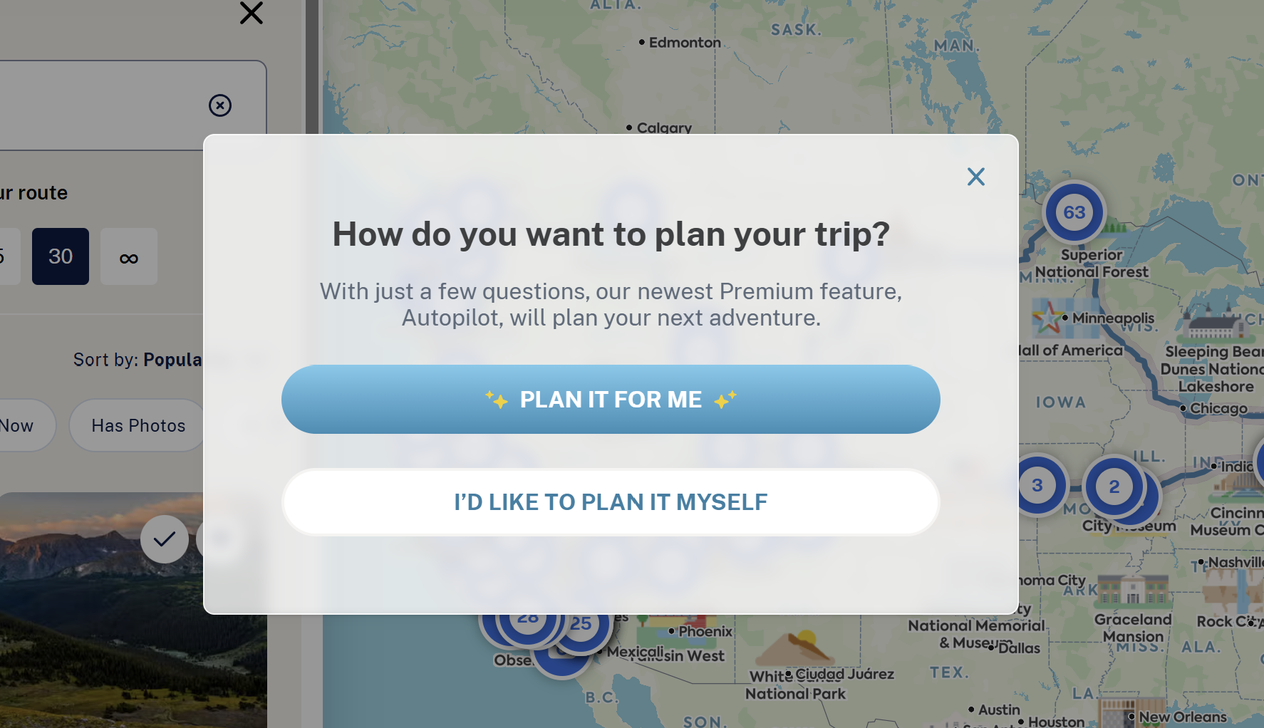 A roadtripper using the Roadtrippers app on a smartphone to plan a road trip with friends.