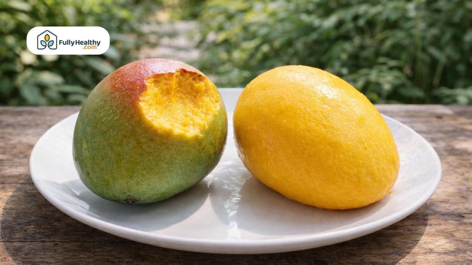 Side-by-side mangoes with and without skin on a white plate